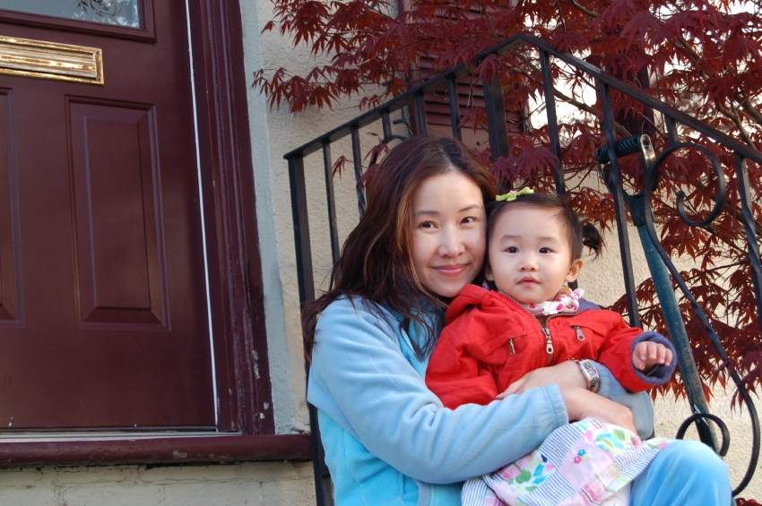 Woman Sitting with Daughter 